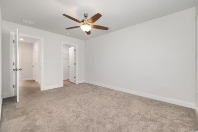 Welcome to this stunning 4-bedroom, 2.5-bathroom townhome on Barefoot Resort and Golf Club  in South Carolina - for sale on GolfHomes.com, golf home, golf lot