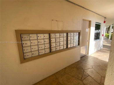 GATED COMMUNITY! ONE BED ONE BATH CONDO WITH LAKE VIEW FROM BACK on Wynmoor Golf Course in Florida - for sale on GolfHomes.com, golf home, golf lot