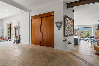 Live inside a work of art in this  Artist's Dream Dwelling in on Taos Country Club in New Mexico - for sale on GolfHomes.com, golf home, golf lot