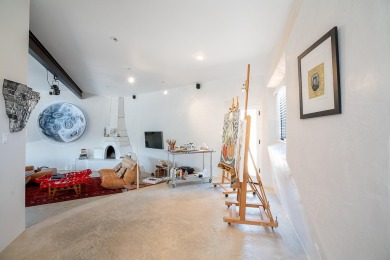 Live inside a work of art in this  Artist's Dream Dwelling in on Taos Country Club in New Mexico - for sale on GolfHomes.com, golf home, golf lot