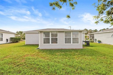 Welcome to this immaculately kept 2-bedroom, 2-bathroom bungalow on Tampa Bay Golf and Country Club in Florida - for sale on GolfHomes.com, golf home, golf lot