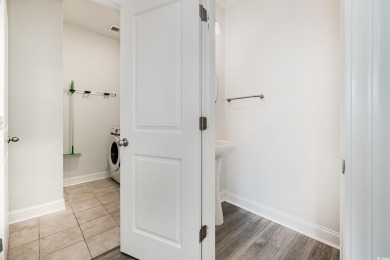 Welcome to this stunning 4-bedroom, 2.5-bathroom townhome on Barefoot Resort and Golf Club  in South Carolina - for sale on GolfHomes.com, golf home, golf lot