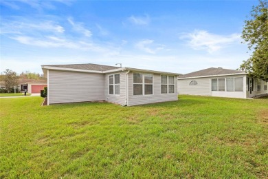 Welcome to this immaculately kept 2-bedroom, 2-bathroom bungalow on Tampa Bay Golf and Country Club in Florida - for sale on GolfHomes.com, golf home, golf lot