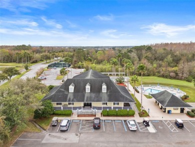 Welcome to this immaculately kept 2-bedroom, 2-bathroom bungalow on Tampa Bay Golf and Country Club in Florida - for sale on GolfHomes.com, golf home, golf lot