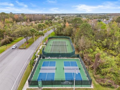 Welcome to this immaculately kept 2-bedroom, 2-bathroom bungalow on Tampa Bay Golf and Country Club in Florida - for sale on GolfHomes.com, golf home, golf lot