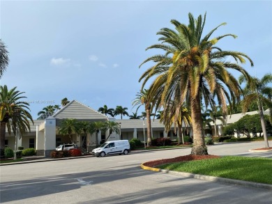 GATED COMMUNITY! ONE BED ONE BATH CONDO WITH LAKE VIEW FROM BACK on Wynmoor Golf Course in Florida - for sale on GolfHomes.com, golf home, golf lot