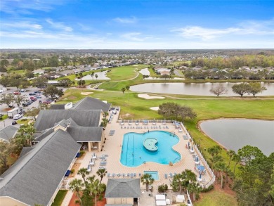 Welcome to this immaculately kept 2-bedroom, 2-bathroom bungalow on Tampa Bay Golf and Country Club in Florida - for sale on GolfHomes.com, golf home, golf lot