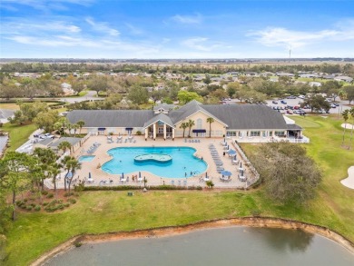 Welcome to this immaculately kept 2-bedroom, 2-bathroom bungalow on Tampa Bay Golf and Country Club in Florida - for sale on GolfHomes.com, golf home, golf lot