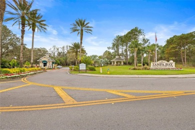 Welcome to this immaculately kept 2-bedroom, 2-bathroom bungalow on Tampa Bay Golf and Country Club in Florida - for sale on GolfHomes.com, golf home, golf lot