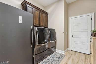 Looking for a stunning home, incredible view, and convenient on Laurel Island Links in Georgia - for sale on GolfHomes.com, golf home, golf lot