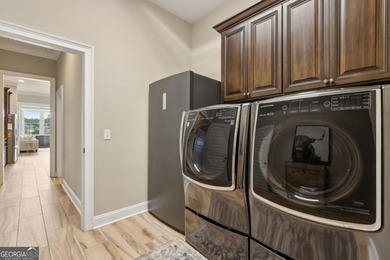 Looking for a stunning home, incredible view, and convenient on Laurel Island Links in Georgia - for sale on GolfHomes.com, golf home, golf lot