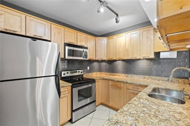 Unparalleled top-floor condo living with Breathtaking Skyline on Bobby Jones Golf Club in Georgia - for sale on GolfHomes.com, golf home, golf lot