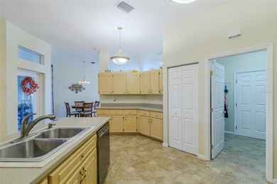 This 3BD/2BA Majesty model home is a beautiful one-level living on Ocala Palms Golf and Country Club in Florida - for sale on GolfHomes.com, golf home, golf lot