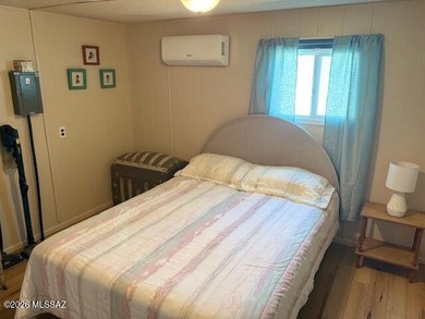 Very nice home with bedrooms in the front and back and living on Tucson Estates Golf Course in Arizona - for sale on GolfHomes.com, golf home, golf lot