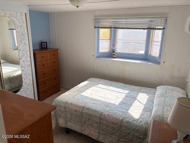 Very nice home with bedrooms in the front and back and living on Tucson Estates Golf Course in Arizona - for sale on GolfHomes.com, golf home, golf lot