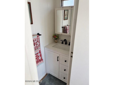 Very nice home with bedrooms in the front and back and living on Tucson Estates Golf Course in Arizona - for sale on GolfHomes.com, golf home, golf lot