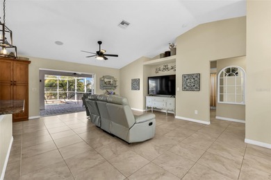 Welcome Home!  Impeccably Maintained 4-bedroom Salt Water Pool on Seminole Lakes Country Club in Florida - for sale on GolfHomes.com, golf home, golf lot