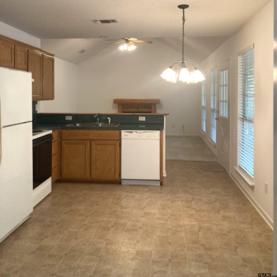 This one-owner home sits on three wooded lots for a total of .75 on Holly Lake Ranch Golf Club in Texas - for sale on GolfHomes.com, golf home, golf lot