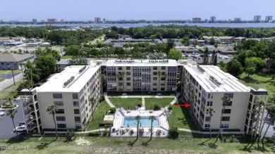Enjoy easy living in this beautifully furnished 2-bedroom on Daytona Beach Golf Club in Florida - for sale on GolfHomes.com, golf home, golf lot