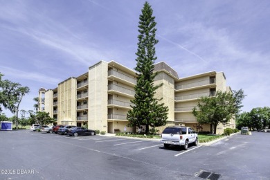 Enjoy easy living in this beautifully furnished 2-bedroom on Daytona Beach Golf Club in Florida - for sale on GolfHomes.com, golf home, golf lot