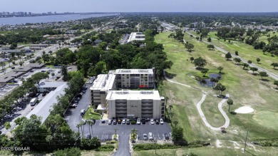 Enjoy easy living in this beautifully furnished 2-bedroom on Daytona Beach Golf Club in Florida - for sale on GolfHomes.com, golf home, golf lot