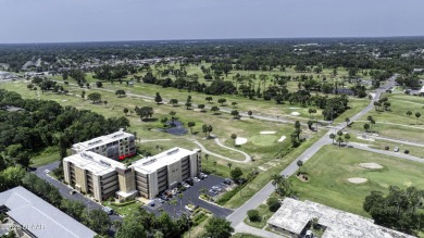 Enjoy easy living in this beautifully furnished 2-bedroom on Daytona Beach Golf Club in Florida - for sale on GolfHomes.com, golf home, golf lot