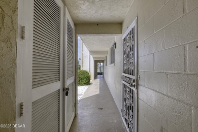 Enjoy easy living in this beautifully furnished 2-bedroom on Daytona Beach Golf Club in Florida - for sale on GolfHomes.com, golf home, golf lot