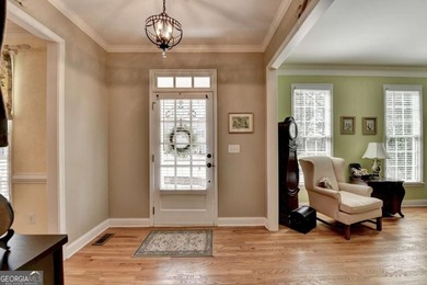 Rare. Refined. Ready to Impress-In Hampton Golf Village. This on Hampton Golf Village in Georgia - for sale on GolfHomes.com, golf home, golf lot