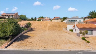 Build your dream home on this spacious 8,234 sqft vacant lot on Spring Valley Lake Country Club in California - for sale on GolfHomes.com, golf home, golf lot