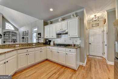 Rare. Refined. Ready to Impress-In Hampton Golf Village. This on Hampton Golf Village in Georgia - for sale on GolfHomes.com, golf home, golf lot