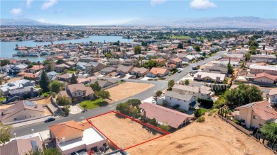 Build your dream home on this spacious 8,234 sqft vacant lot on Spring Valley Lake Country Club in California - for sale on GolfHomes.com, golf home, golf lot