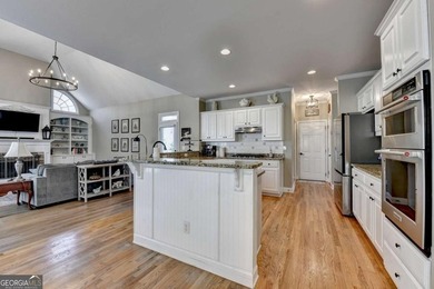 Rare. Refined. Ready to Impress-In Hampton Golf Village. This on Hampton Golf Village in Georgia - for sale on GolfHomes.com, golf home, golf lot