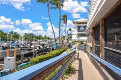 Experience resort-style living in Bonita Bay from this elegant on Bonita Bay West in Florida - for sale on GolfHomes.com, golf home, golf lot