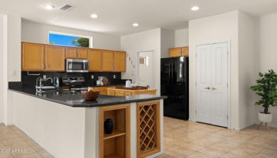 Coveted 3-car garage in The Grand! This open floor plan offers on Granite Falls Golf Club  in Arizona - for sale on GolfHomes.com, golf home, golf lot
