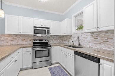 Located on the top floor of a two-story building, this well-kept on Myrtlewood Golf Course and Club  in South Carolina - for sale on GolfHomes.com, golf home, golf lot