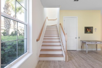 LUXURY MEETS COASTAL BEAUTY. This beautifully built 3-bedroom, 2 on The Ocean Course At Hammock Beach Resort in Florida - for sale on GolfHomes.com, golf home, golf lot