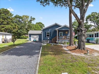 Welcome to 505 Magnolia Drive in peaceful 
Seaside Station. This on Oyster Bay Golf Links in North Carolina - for sale on GolfHomes.com, golf home, golf lot