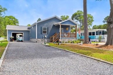 Welcome to 505 Magnolia Drive in peaceful 
Seaside Station. This on Oyster Bay Golf Links in North Carolina - for sale on GolfHomes.com, golf home, golf lot