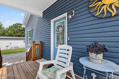 Welcome to 505 Magnolia Drive in peaceful 
Seaside Station. This on Oyster Bay Golf Links in North Carolina - for sale on GolfHomes.com, golf home, golf lot