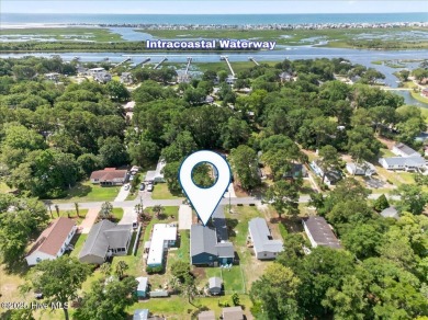 Welcome to 505 Magnolia Drive in peaceful 
Seaside Station. This on Oyster Bay Golf Links in North Carolina - for sale on GolfHomes.com, golf home, golf lot