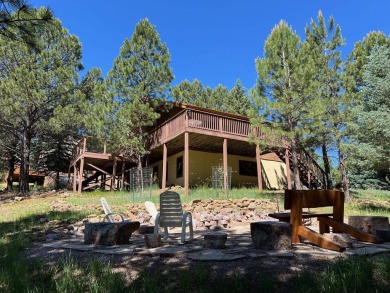 Conveniently located 3 bedrooms, 2 1/2-bathroom cabin in Angel on Angel Fire Resort Country Club in New Mexico - for sale on GolfHomes.com, golf home, golf lot