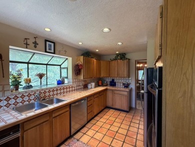 Conveniently located 3 bedrooms, 2 1/2-bathroom cabin in Angel on Angel Fire Resort Country Club in New Mexico - for sale on GolfHomes.com, golf home, golf lot