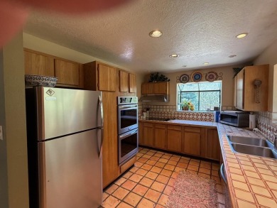 Conveniently located 3 bedrooms, 2 1/2-bathroom cabin in Angel on Angel Fire Resort Country Club in New Mexico - for sale on GolfHomes.com, golf home, golf lot
