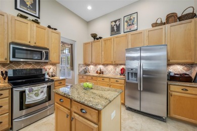 Under contract-accepting backup offers. Lovely 4 bedroom, 3 bath on TPC of Tampa Bay in Florida - for sale on GolfHomes.com, golf home, golf lot