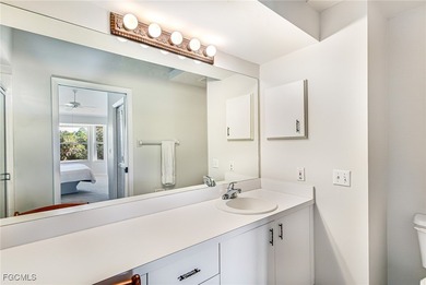 Discover Florida living at its finest in this beautifully on Olde Hickory Golf and Country Club in Florida - for sale on GolfHomes.com, golf home, golf lot