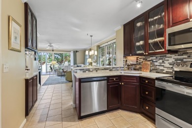 This updated 4-bedroom, 3-bathroom townhome in the gated Key on Key West Golf Club in Florida - for sale on GolfHomes.com, golf home, golf lot