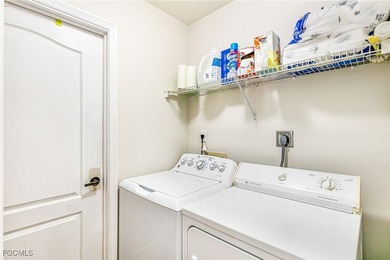 Discover Florida living at its finest in this beautifully on Olde Hickory Golf and Country Club in Florida - for sale on GolfHomes.com, golf home, golf lot