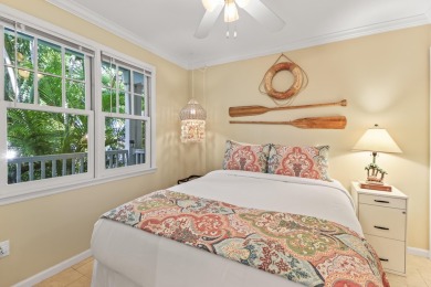 This updated 4-bedroom, 3-bathroom townhome in the gated Key on Key West Golf Club in Florida - for sale on GolfHomes.com, golf home, golf lot