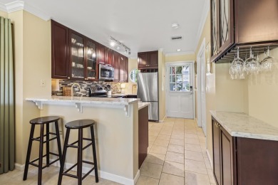 This updated 4-bedroom, 3-bathroom townhome in the gated Key on Key West Golf Club in Florida - for sale on GolfHomes.com, golf home, golf lot