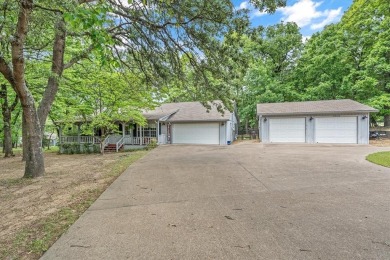 Immaculate home on 3 wooded lots in highly sought-after gated on Holly Lake Ranch Golf Club in Texas - for sale on GolfHomes.com, golf home, golf lot